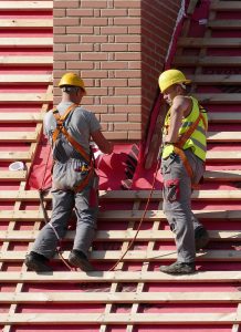 Workers on a roof