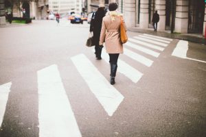 People crossing the street in a crosswalk