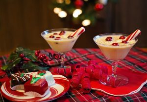 A holiday spread with martini glasses of eggnog