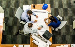 Three people having a meeting in an office